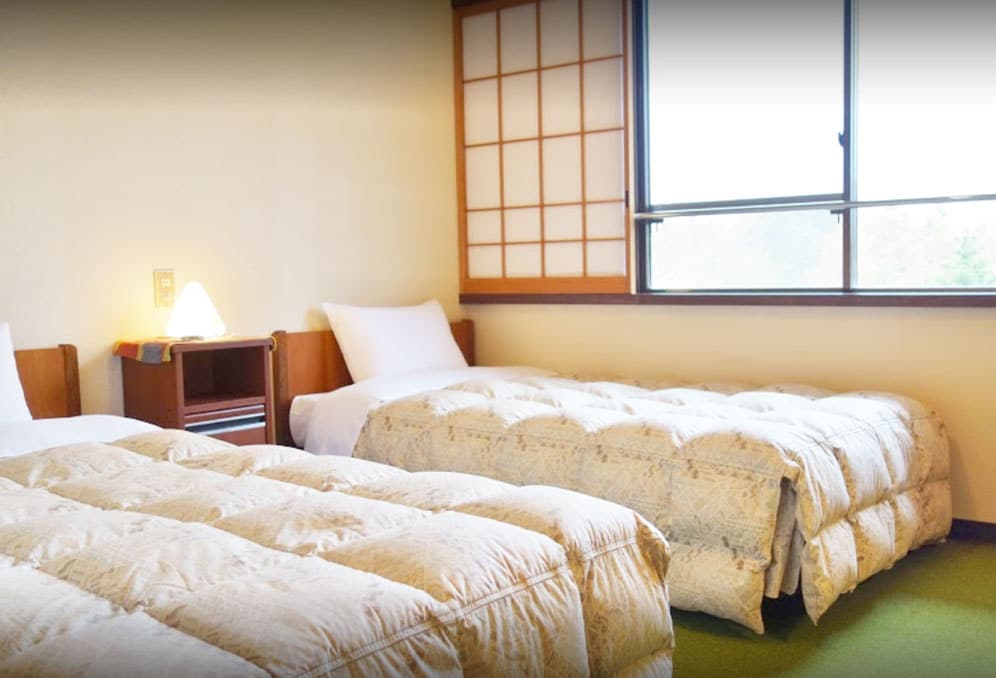 施設情報　客室　ベッド